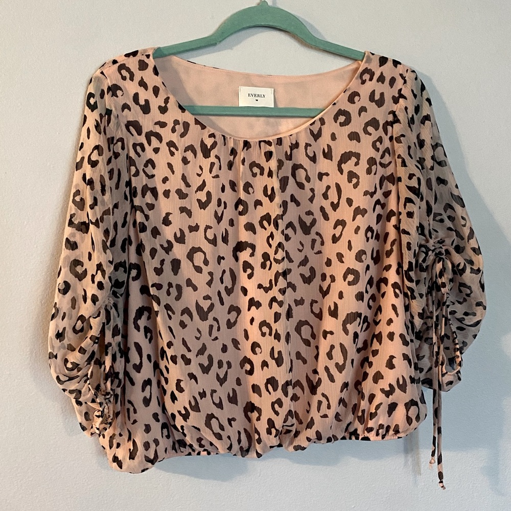 Brand Everly. Color Pink with black cheetah print. Size Large